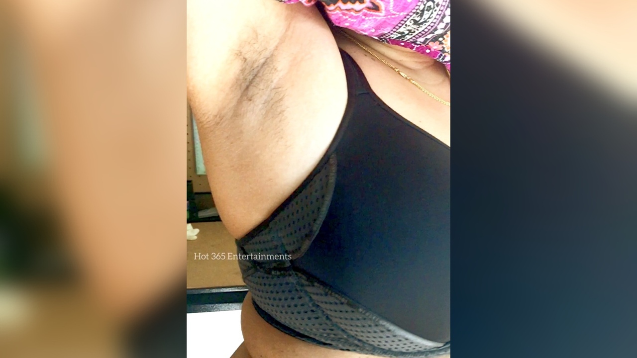 Curvy Maid flashes her Hairy Armpit and Navel pic