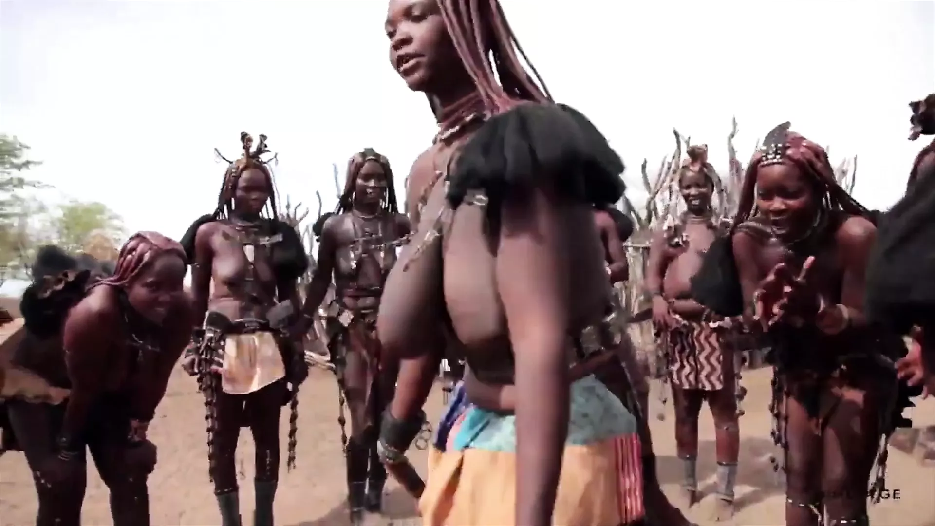 African Himba women dance and swing their saggy tits around pic
