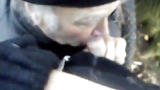 Old man sucking cock in park