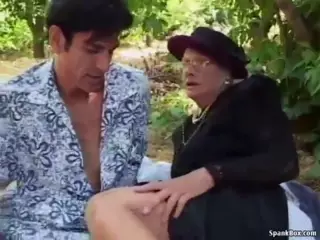 Granny wife squirts outdoors