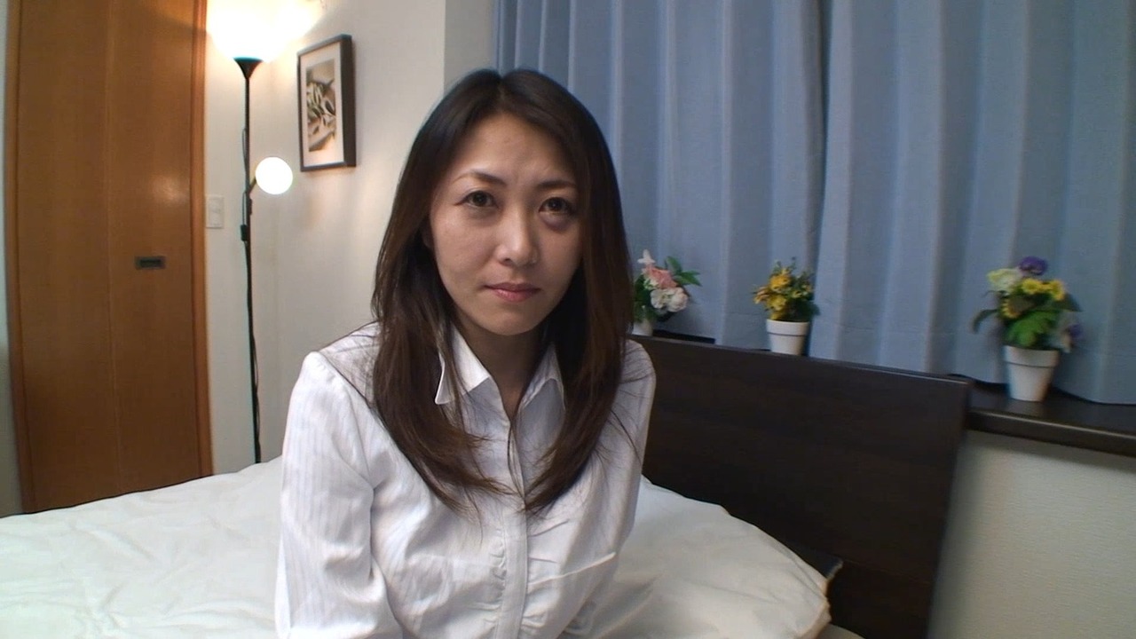 Hairy Japanese mature is doing her first porn video image