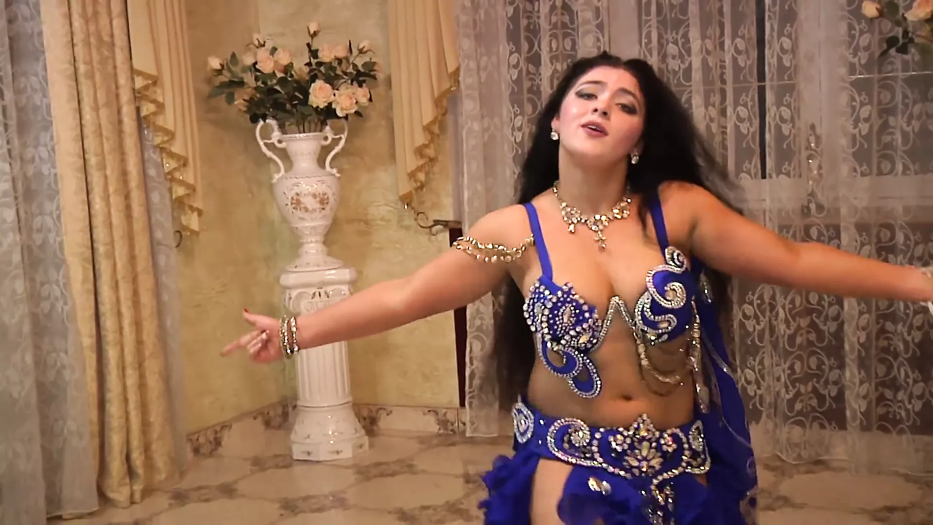 Aziza, A Busty Belly Dancer