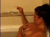 Hot Busty Aged Cougar Smokin' 120s In Tub