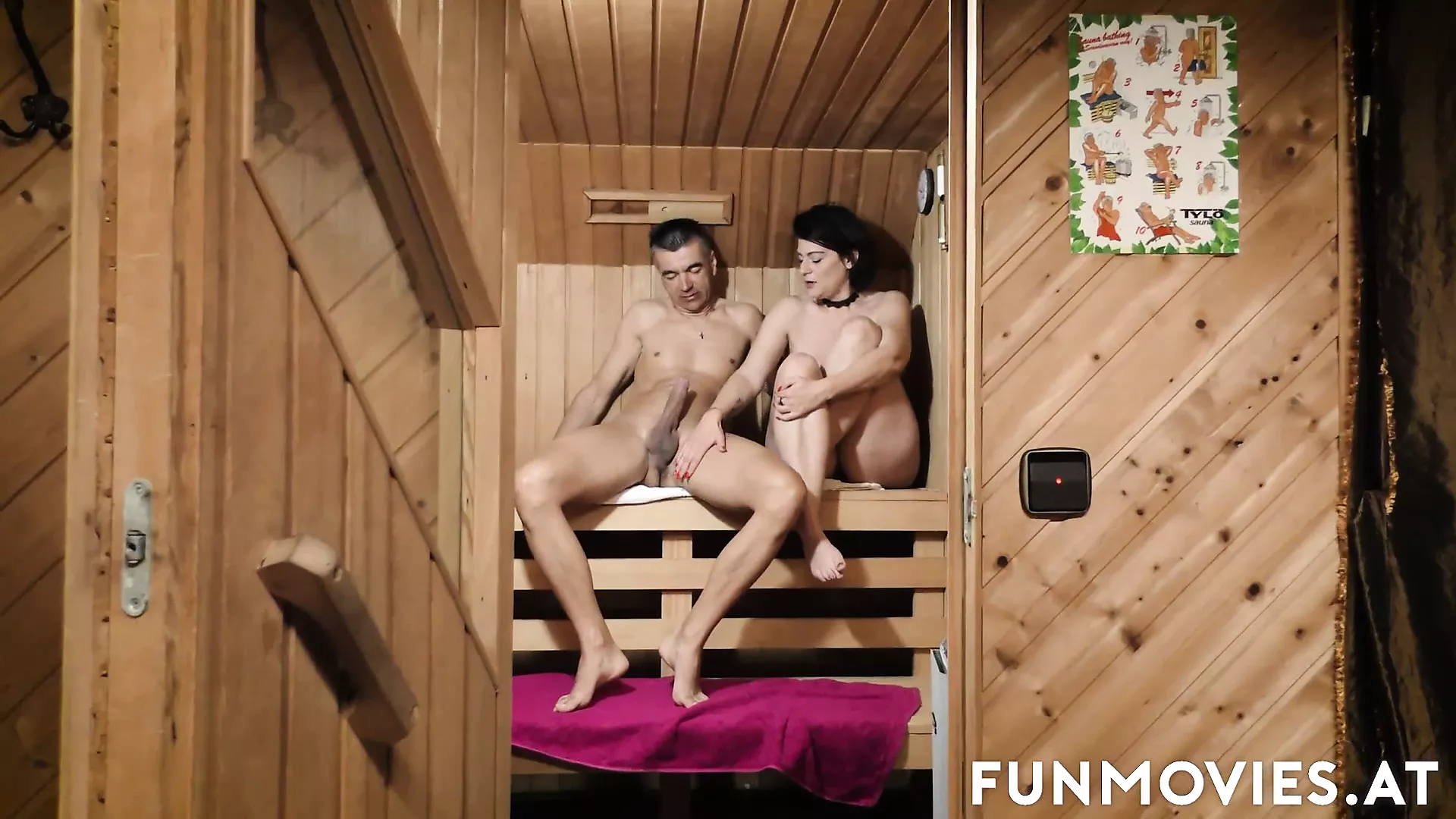 Couple fucking in sauna