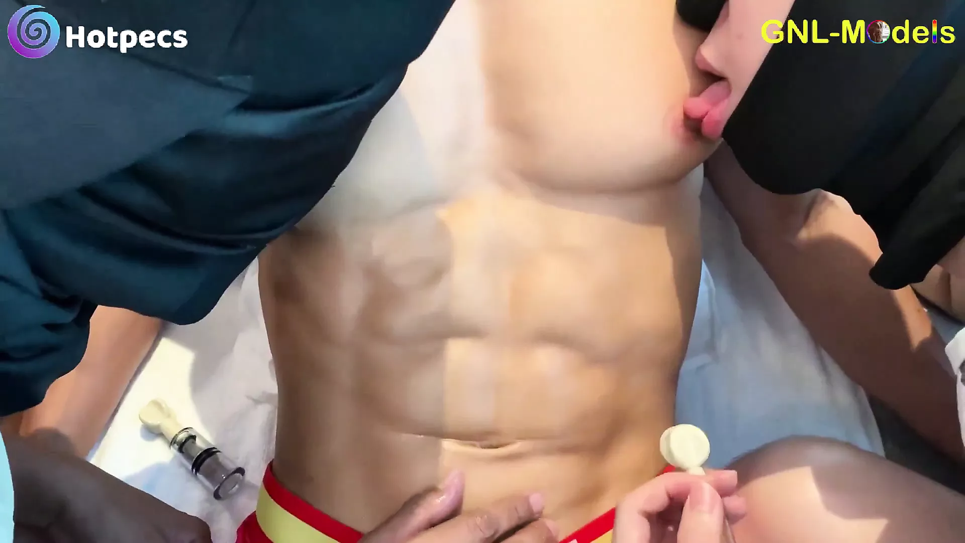 Hot Asian guy getting nipple sucked and played by 2! picture