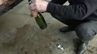 Girl masterbating with a champagne bottle