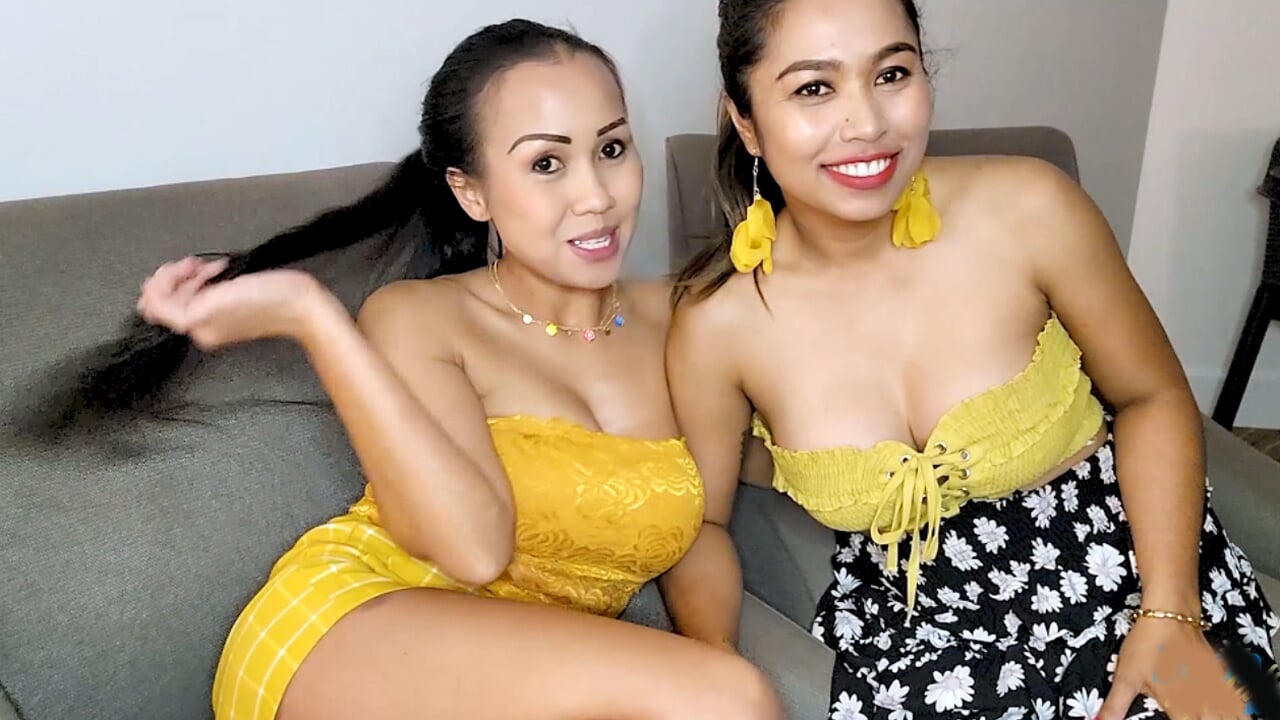 Big boobs Thai lesbian girlfriends having sexual fun in this homemade video picture image