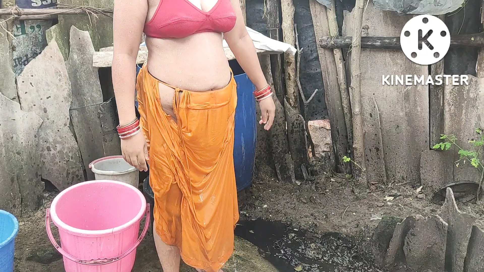 Indian Housewife Bathing Outside