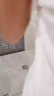 Caught his girl in the shower with a big dildo