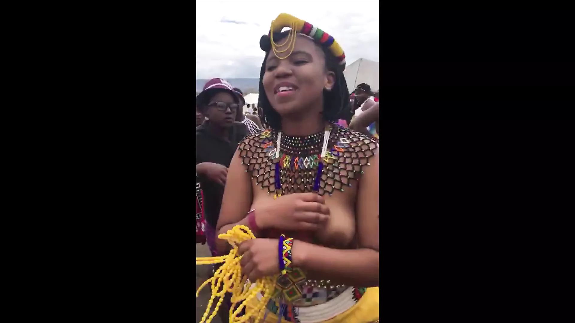 Busty South African girls singing and dancing topless photo