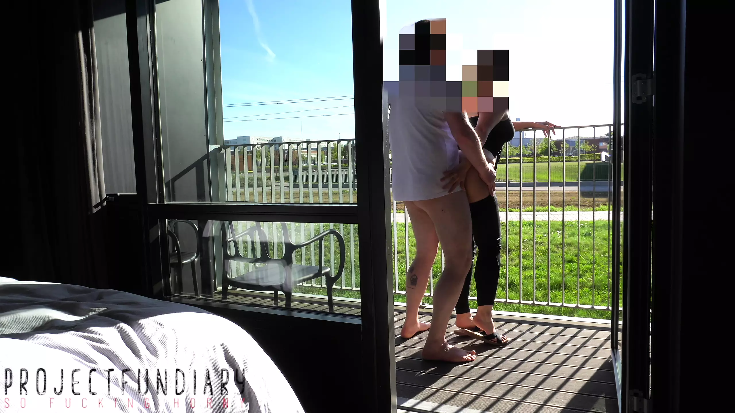 risky public balcony sex with people watching image