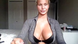 Athletic blonde showing her body and pussy to the camera