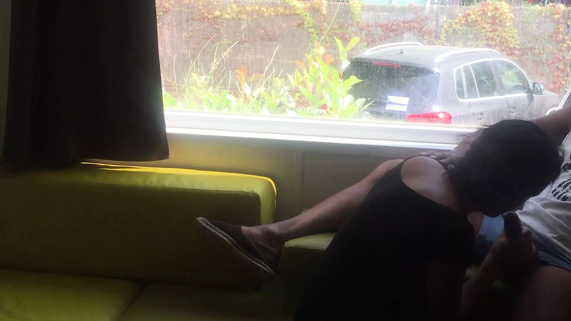 Wife giving risky blowjob in front of window in a camper