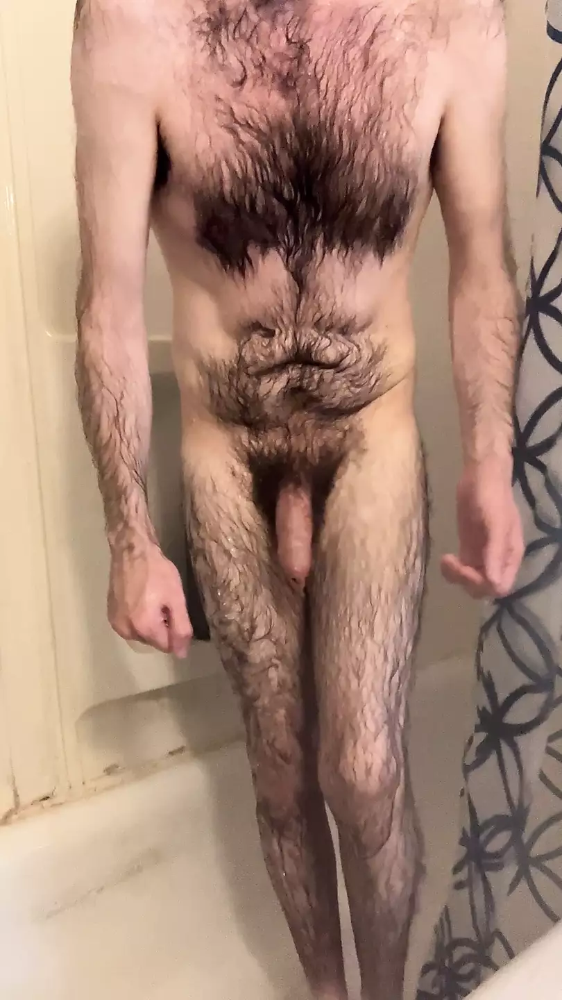 Skinny hairy white dude with a big uncut cock takes a quick shower