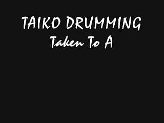 Naked drumming woman - Japanese taiko drumming