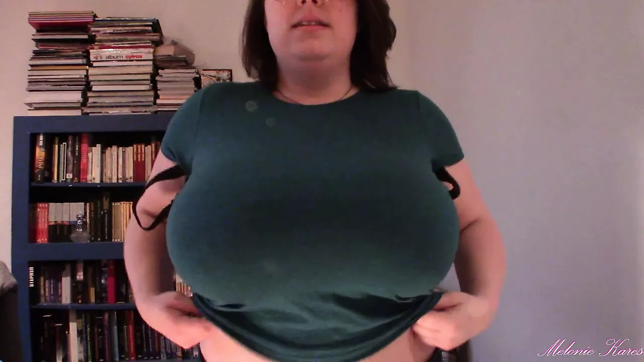 Huge boobs, tit drop, blue shirt pic