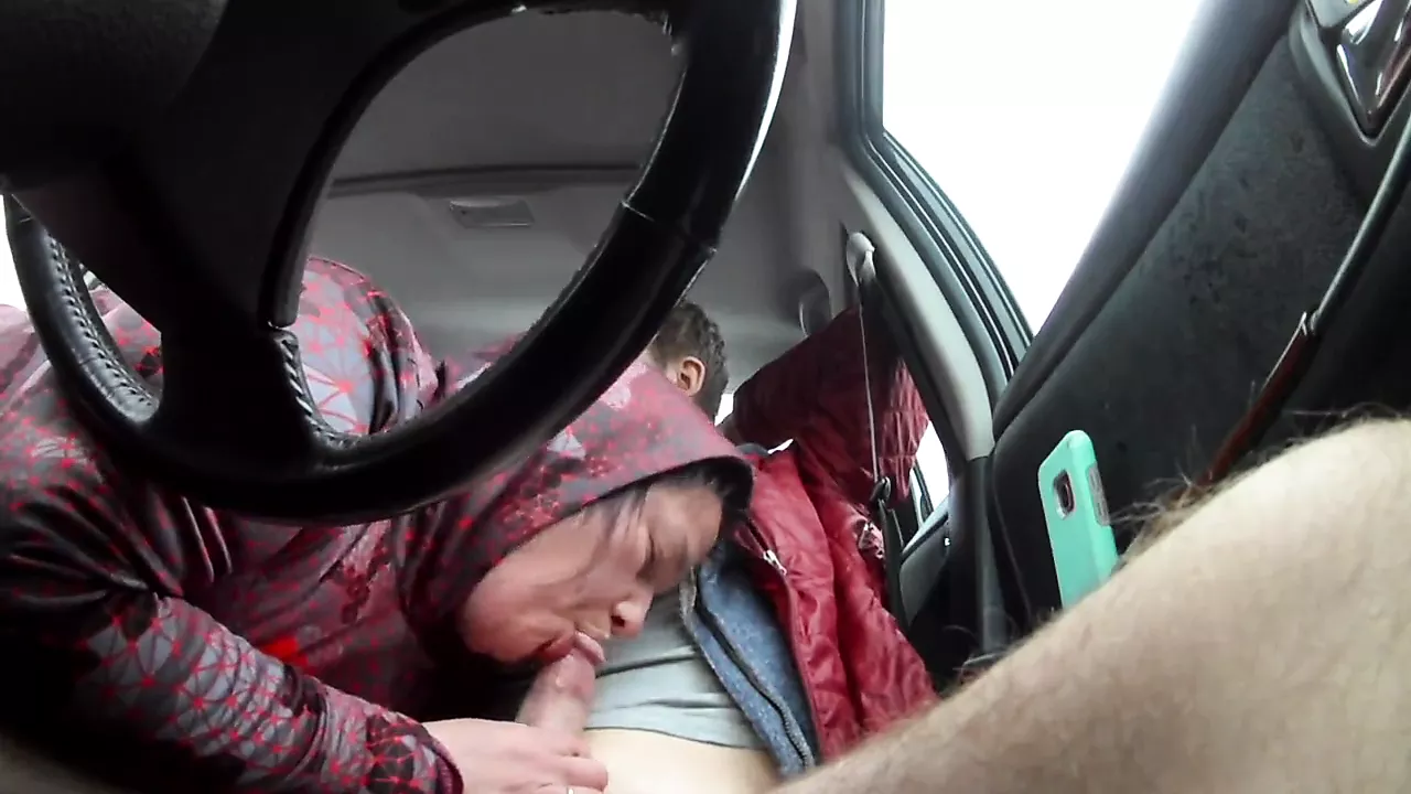 Mature prostitute sucking guy off in car, second camera picture photo