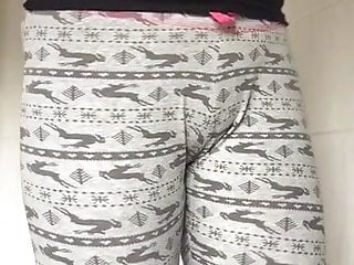 Girl peeing pants videos - Nice babe in black top standing peeing in pajama pants