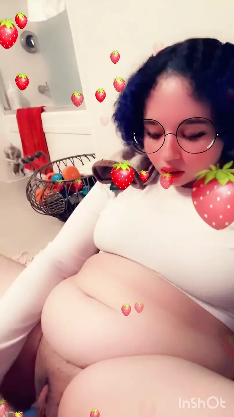 Goth chubby nerd girl plays with her tight fat pussy photo