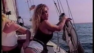 Blond lesbo partners suck and fuck on boat